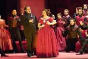 Tenor Garrett Sorenson as Alfredo and soprano Dina Kuznetsova as Violetta with the cast of La traviata, La Traviata, Boston Lyric Opera, 2006