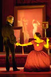 Bass David M. Cushing as Dr. Grenvil and soprano Dina Kuznetsova as Violetta, La Traviata, Boston Lyric Opera, 2006