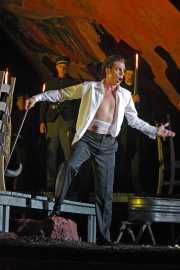 Famous bull fighter Escamillo (bass-baritone Daniel Mobbs) impresses his fans with the trials and tribulations of being a toreador., Carmen, Boston Lyric Opera, 2009