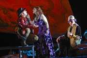 , CarmenRemendado (tenor Darren Anderson), a fellow gypsy, is amused by Carmen’s (mezzo-soprano Dana Beth Miller) proclamations of love for a soldier as gypsy leader Dancaïro (baritone Andrew Garland) listens with distain, Boston Lyric Opera, 2009
