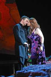 Don José (tenor John Bellemer) and Carmen (mezzo-soprano Dana Beth Miller) share a rare tender moment., Carmen, Boston Lyric Opera, 2009