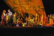 Don José (tenor John Bellemer) realizes he is forced to join Carmen (mezzo-soprano Dana Beth Miller) and her fellow gypsies after committing a major crime., Carmen, Boston Lyric Opera, 2009