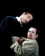 Don Giovanni (baritone Christopher Schaldenbrand) commands his conflicted servant Leporello (bass-baritone Matthew Burns) to perform one last task for him, Don Giovanni, Boston Lyric Opera, 2009