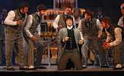 Hoffmann (tenor Gerard Powers) captivates tavern patrons with his story telling, Les contes d’Hoffmann, Boston Lyric Opera, 2009