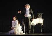 Antonia (soprano Georgia Jarman) falls under the deadly spell of the evil Dr. Miracle (baritone Gaétan Laperrière), Les contes d’Hoffmann, Boston Lyric Opera, 2009