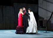 Rusalka (soprano Marquita Lister) tries to pull her fiancé, the Prince (tenor Bryan Hymel) away from his new object of affection, the Foreign Princess (soprano Rochelle Bard), Rusalka, Boston Lyric Opera, 2009