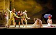 The commedia dell’arte troupe (tenor Julius Ahn, bass David Cushing, tenor Tracy Wise, baritone Jesse Blumberg) try to cheer grief-struck Ariadne as fellow troupe member Zerbinetta (soprano Rachele Gilmore) attempts to restore Ariadne’s faith in life and love., Ariadne auf Naxos, Boston Lyric Opera, 2010