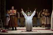The Greek prince Idamante (mezzo-soprano Sandra Piques Eddy) offers himself to be sacrificed by his father, Idomeneo (tenor Jason Collins), to pay off the king’s debt to Neptune and save the people of Crete, Idomeneo re di Creta, Boston Lyric Opera, 2010