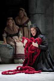 The notorious Greek princess Elettra (soprano Caroline Worra) begins to lose her mind as her final dreams of happiness unravel, Idomeneo re di Creta, Boston Lyric Opera, 2010
