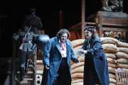 Floria Tosca (soprano Jill Gardner) reassures her love, Mario Cavaradossi, (tenor Diego Torre) that she saved his life, Tosca, Boston Lyric Opera, 2010