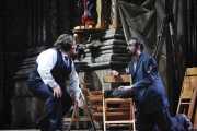 The political dissident Angelotti (baritone Anton Belov, on right) begs Mario Cavaradossi (tenor Diego Torre) to help him hide from Baron Scarpia, Tosca, Boston Lyric Opera, 2010