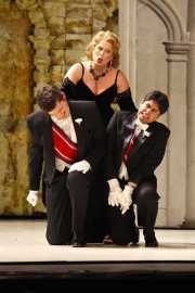 Agrippina (Soprano Caroline Worra) punishes Pallante (Baritone David McFerrin) and Narciso (Countertenor José Álvarez) for their efforts to thwart her campaign to make her son Emperor. Photo taken at final dress rehearsal of BLO’s Agrippina by Jeffrey Dunn for Boston Lyric Opera © 2011