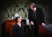(l.-r.) Fearing what may happen during her husband’s departure, Kátya (Elaine Alvarez) implores Tichon (Alan Schneider) to lay down some rules for her while he is away in Boston Lyric Opera’s production of Kátya Kabanová, composed by Leoš Janáček. 2015