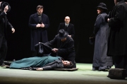 Grieving husband Tichon (Alan Schneider) prepares to cover Kátya’s lifeless body (Elaine Alvarez) in Boston Lyric Opera’s production of Kátya Kabanová, composed by Leoš Janáček. 2015