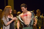 Carmen (Jennifer Johnson Cano) scrawls “love” on the chest of solider Joseph Yonaitis in Boston Lyric Opera’s production of Georges Bizet’s “Carmen” directed by Calixto Bieito. “Carmen” opens BLO’s 40th Season, at the Boston Opera House through October 2.