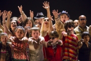 The townspeople wave excitedly at the dashing picadors and toreadors who parade by on their way to the bullfight in Boston Lyric Opera’s production of Georges Bizet’s “Carmen” directed by Calixto Bieito. “Carmen” opens BLO’s 40th Season, at the Boston Opera House through October 2.