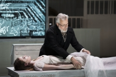 KNOX AND MARY -- Dr. Knox (William Burden) tends to the freshly delivered body of the wayward young woman Mary Paterson in Boston Lyric Opera’s world premiere production of THE NEFARIOUS, IMMORAL BUT HIGHLY PROFITABLE ENTERPRISE of MR. BURKE and MR. HARE by composer Julian Grant and librettist Mark Campbell. Runs Nov 8-12; details at BLO.org.