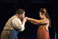 Artist Cavaradossi (Jonathan Burton) kisses the hand of singer Floria Tosca (Elena Stikhina) in the Boston Lyric Opera production of TOSCA, running Oct 13-22 at the Cutler Emerson Majestic Theater. Tickets BLO.org.