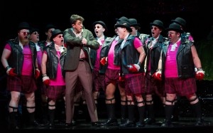 Tom Rakewell (Ben Bliss, center left) meets a band of London hooligans who take him on the first steps of his downfall in Boston Lyric Opera’s new production of Stravinsky’s THE RAKES PROGRESS, running through March 19 at the Emerson Majestic Theater