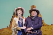 In the style of a cowboy western film, Arnold Schoenberg (Omar Ebrahim, r.) and his second wife Gertrud Kolisch (Sarah Womble, l.) trek across the country to their ultimate destination of Los Angeles in Boston Lyric Opera’s World Premiere SCHOENBERG IN HOLLYWOOD by composer Tod Machover and librettist Simon Robson.