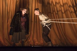 Mrs. Peachum (Michelle Trainor) berates Macheath (Christopher Burchett) whose arrest she helped secure, in the Boston Lyric Opera’s production of Weill and Brecht’s THE THREEPENNY OPERA, running March 16-25 at the Huntington Avenue Theatre.  BLO.org.