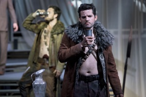 Junius (David McFerrin) and his soldier comrades spend an evening on the battlefield drinking wine and absorbing news of their wives’ infidelity back home in Boston Lyric Opera’s production of “The Rape of Lucretia” March 11-17 at Artists for Humanity EpiCenter.