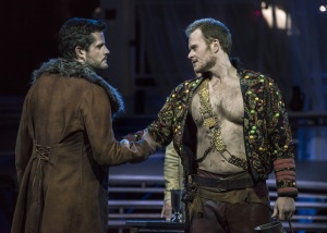 (L.-r.) Junius (David McFerrin), encourages unity with Tarquinius (Duncan Rock) after a confrontation about the loyalty of their wives and lovers in Boston Lyric Opera’s production of “The Rape of Lucretia” March 11-17 at Artists for Humanity EpiCenter.