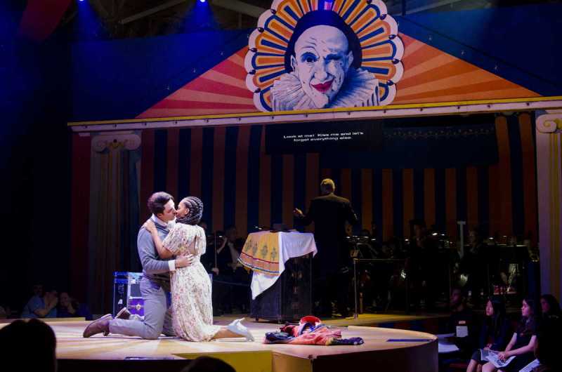Lauren Michelle’s character Nedda performs as Colombina and Omar Najmi’s character performs as her lover, Harlequin. Boston Lyric Opera's 2019 production of Pagliacci