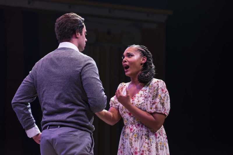 As Nedda, the only woman in a traveling commedia dell’arte theater troupe, Lauren Michelle (r.) confides to her lover Silvio (Tobias Greenhalgh) that their affair may put them both in danger in Boston Lyric Opera’s production of Ruggero Leoncavallo’s Pagliacci.