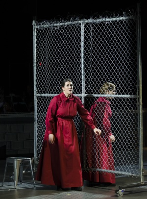 Moira (Chelsea Basler) tells Offred (Jennifer Johnson Cano) about her plans to escape the Handmaid life in Boston Lyric Opera’s production of “The Handmaid’s Tale,” running through May 12. BLO.org.