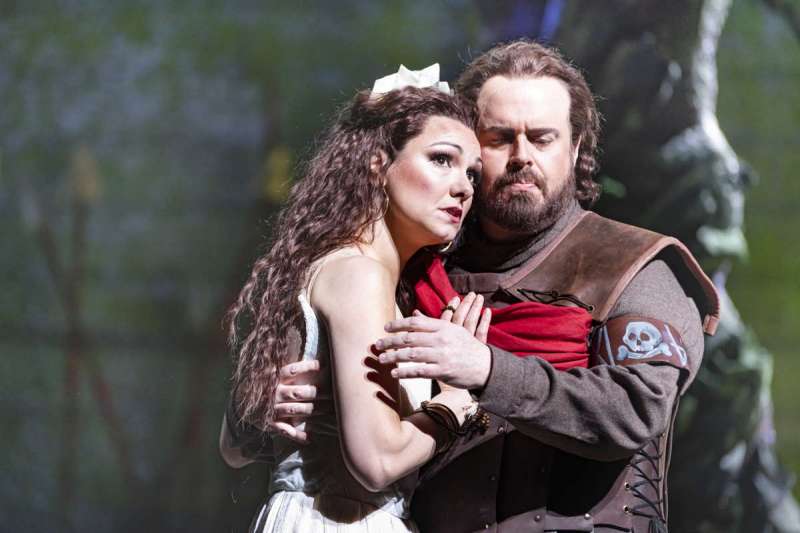 Jonathan Burton as Pollione embraces Sandra Piques Eddy as Adalgisa while trying to persuade her to run away to Rome in Boston Lyric Opera's 2020 production of Norma