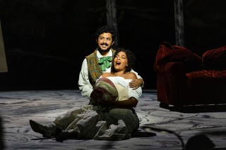 Jesus Garcia as Rodolfo and Lauren Michelle as Mimi share a happy remembrance in BLO's La boheme