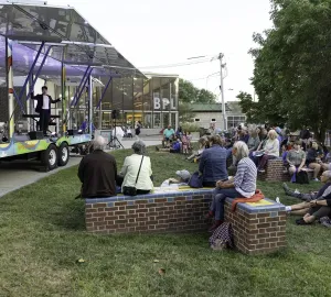 Audience members enjoy a Summer 2025 Street Stage performance at Curtis Hall